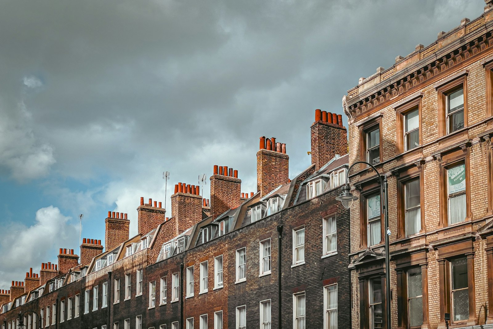 Row of UK redbrick terraced houses